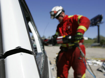 A cut is shown in the car's main supports as Hillsborough County Fire Dept. Special Operat