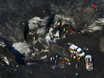 Rescue teams at the scene after an ice cave partially collapsed, at the Breidamerkurjokull