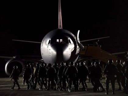 Mexican troops arrive at a military base in Culiacan, Mexico, Friday, Oct. 18, 2019.