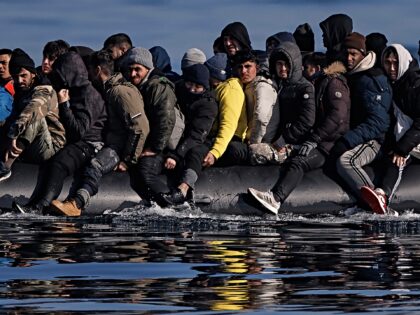 ENGLISH CHANNEL - MARCH 06: An inflatable dinghy carrying around 65 migrants crosses the E