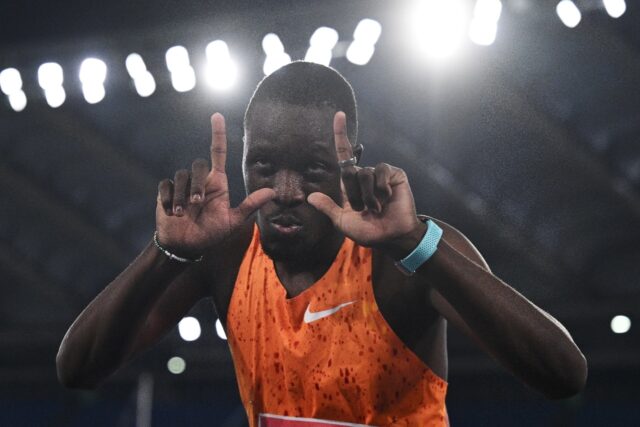 Botswana's Letsile Tebogo celebrates after winning the men's 100m in Rome