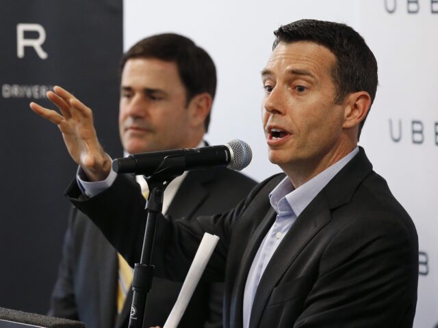 David Plouffe, right, Uber senior vice president of policy and communications, talks about