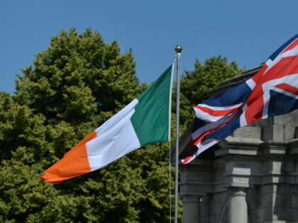 Irish and Union Jack flags seen during a wreath laying ceremony marking the 105th annivers