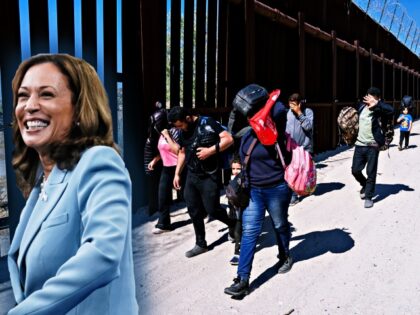 JACUMBA HOT SPRINGS, CA - JUNE 14: Migrants walk along the border fence after crossing int