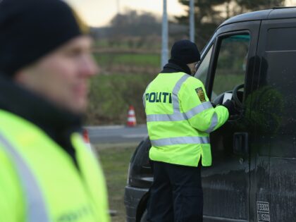 PADBORG, DENMARK - JANUARY 06: Danish police conducting spot checks on incoming traffic ch