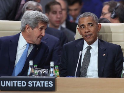 WARSAW, POLAND - JULY 08: U.S. President Barack Obama (R) and Secretary of State John Ker