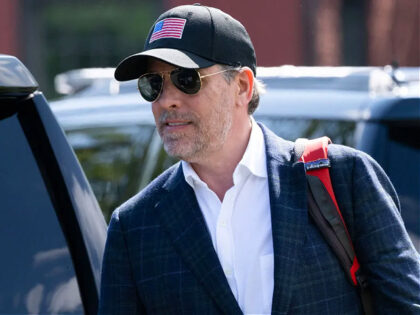 Hunter Biden walks to a waiting SUV after arriving with US President Joe Biden on Marine O