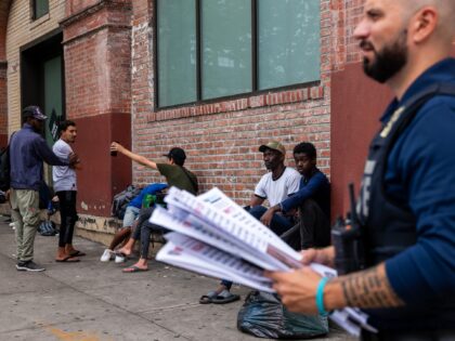 NEW YORK, NEW YORK - JULY 24: Police put up 'wanted' posters outside of two shelters in Br