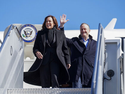 Vice President Kamala Harris and Second Gentleman Douglas Emhoff disembark Air Force Two a