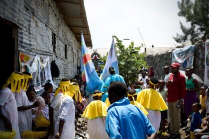 Sect members gathered at the temple on the first anniversary of the massacre