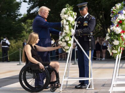 Former U.S. Marine Corps Cpl. Kelsee Lainhart left, and Republican presidential nominee fo