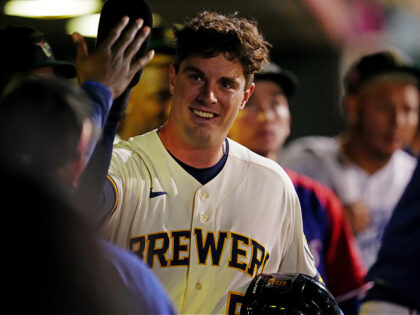 SCOTTSDALE, AZ - NOVEMBER 11: Wes Clarke #5 of the Surprise Saguaros celebrates after scor