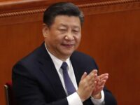 China -- In this Sunday, March 11, 2018, photo, Chinese President Xi Jinping applauds afte