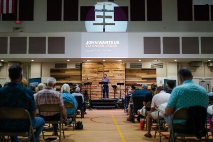 Yance Thompson preaches a sermon at Clayton Baptist Church in Rabun County, where religion